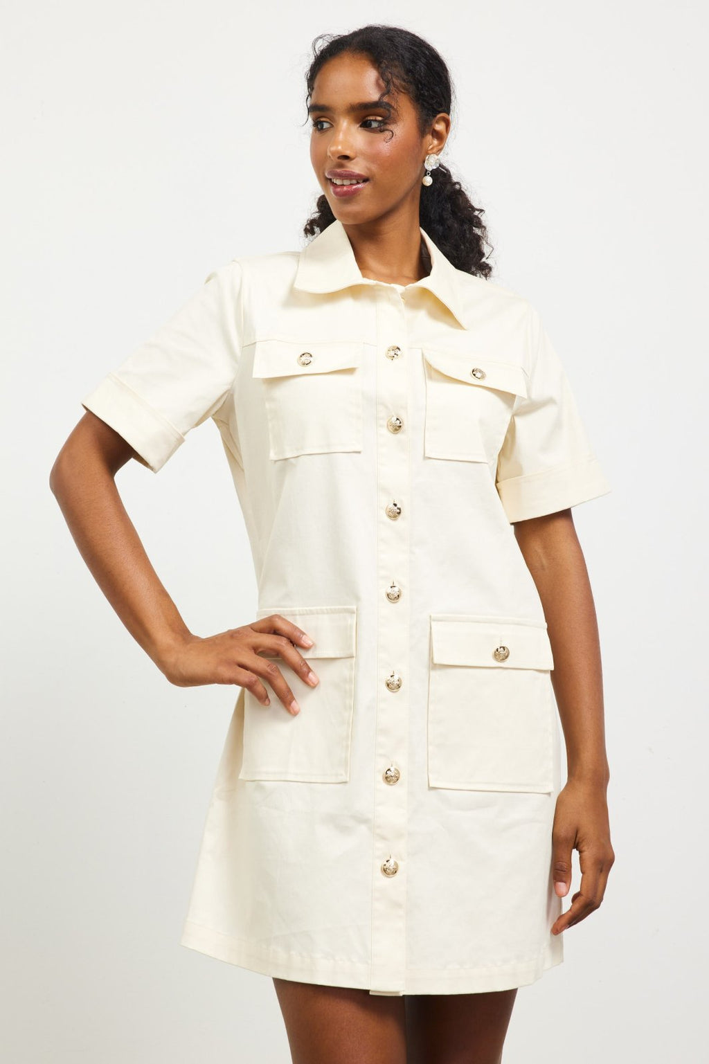 Scottie Dress from a coastal boutique, perfect for beach outings and stylish lunches. 97% Cotton, 3% Spandex.
