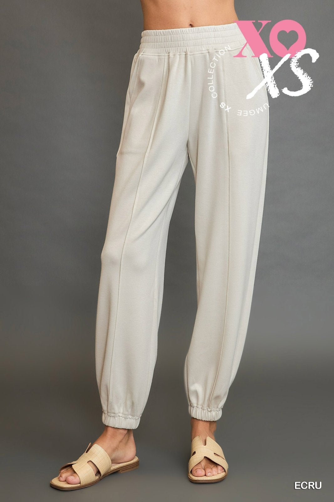 Ecru jogger suit from Port Aransas boutique, perfect for coastal outings. Stylish bottoms for women's curated fashion wardrobe.