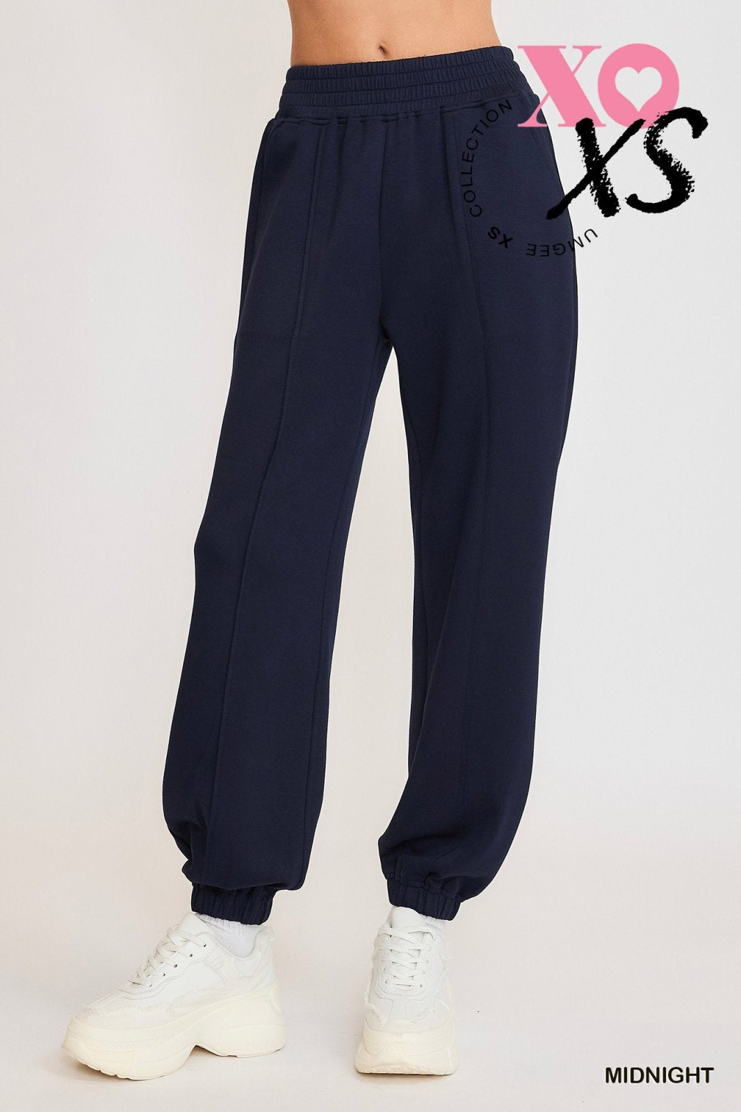 Midnight jogging suit in navy, ideal for stylish women’s fashion. Perfect for beach dresses and curvy plus size fashion.