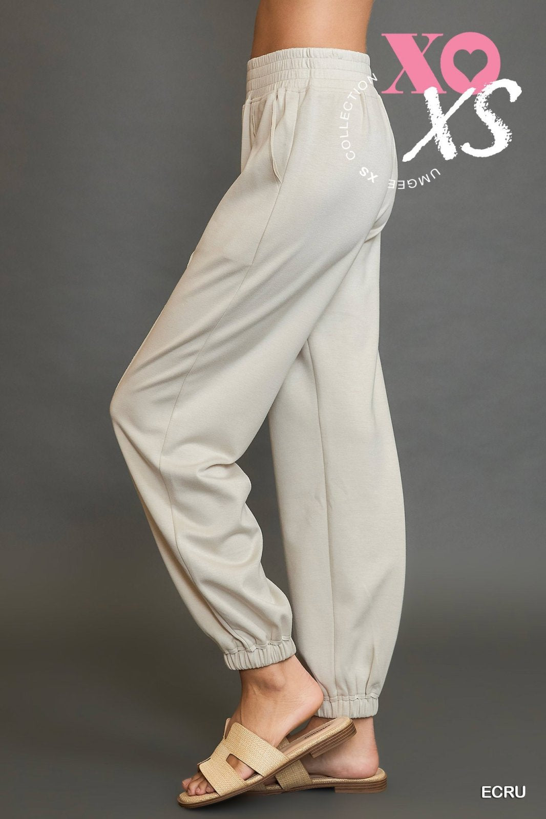 Ecru jogger suit featuring a relaxed fit, perfect for coastal boutique clothing and curvy plus size fashion.