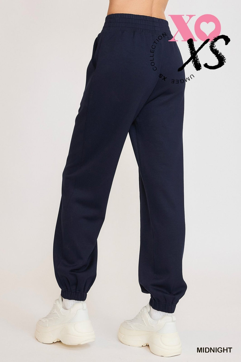Midnight jogging suit for women, perfect for coastal boutique clothing and curvy plus size fashion. Ideal for stylish leisurewear.