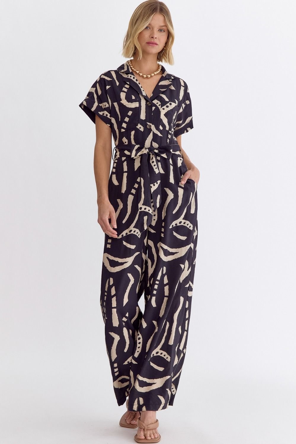 BLACK PRINT DETAIL JUMPSUIT from Raggdoll Boutique, trendy coastal style for summer outfits Texas.