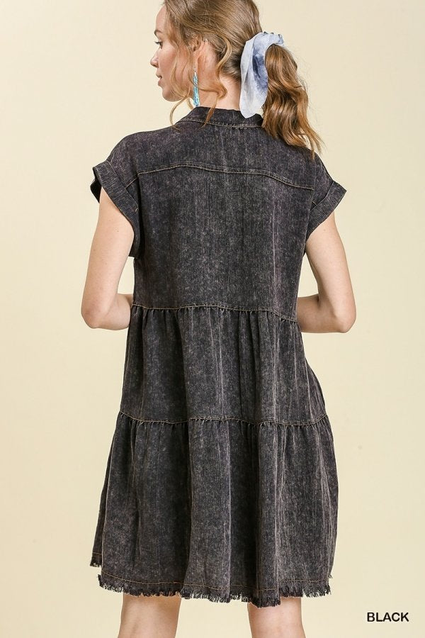 Back view of the SNOW WASHED BLACK RUFFLE DRESS showcasing trendy coastal style. Available at Raggdoll Boutique.
