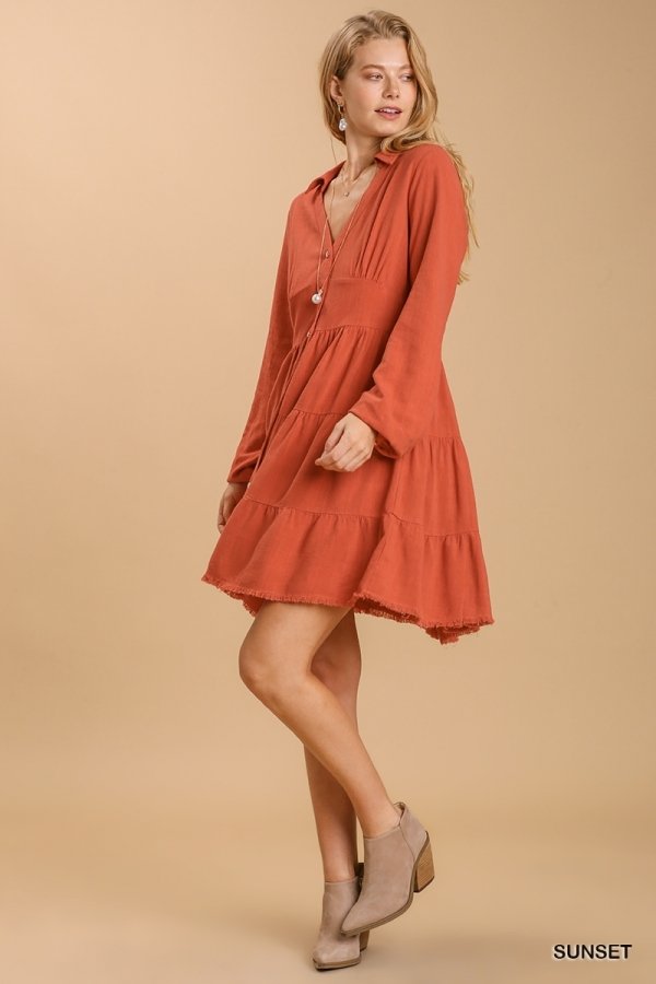 SUNSET TIERED DRESS displayed in warm rust color, perfect for trendy coastal style from Raggdoll Boutique.