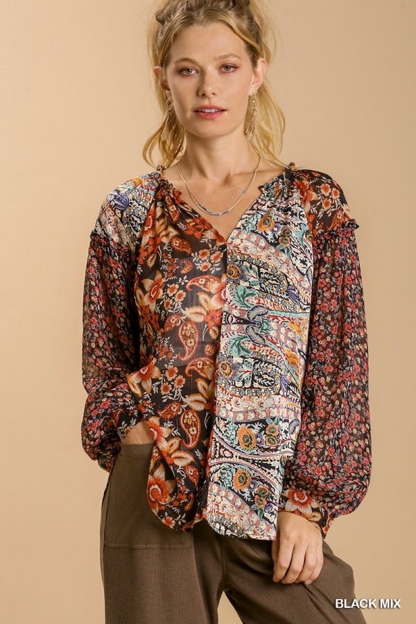 FLORAL BLACK MIX TOP displayed on model, showcasing a trendy coastal style from Raggdoll Boutique.