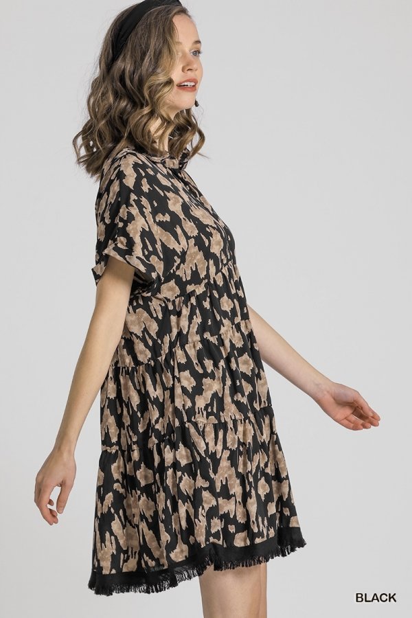 FUN ANIMAL PRINT BLACK AND CREAM DRESS model showcasing coastal fashion style by Raggdoll Boutique