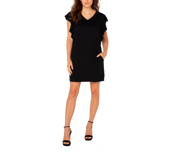 Stylish black flutter sleeve dress from Liverpool, perfect for coastal boutique clothing and tropical vacation styles.