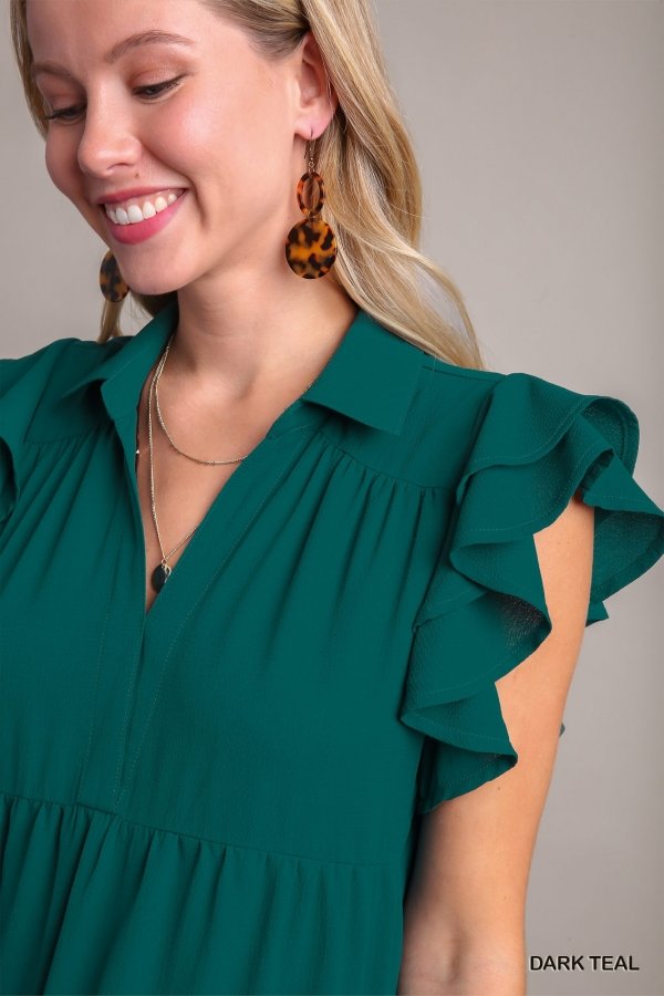 Model wearing the Teal So Lovely Dress, perfect for coastal boutique clothing, stylish for tropical vacations and curvy plus size fashion.