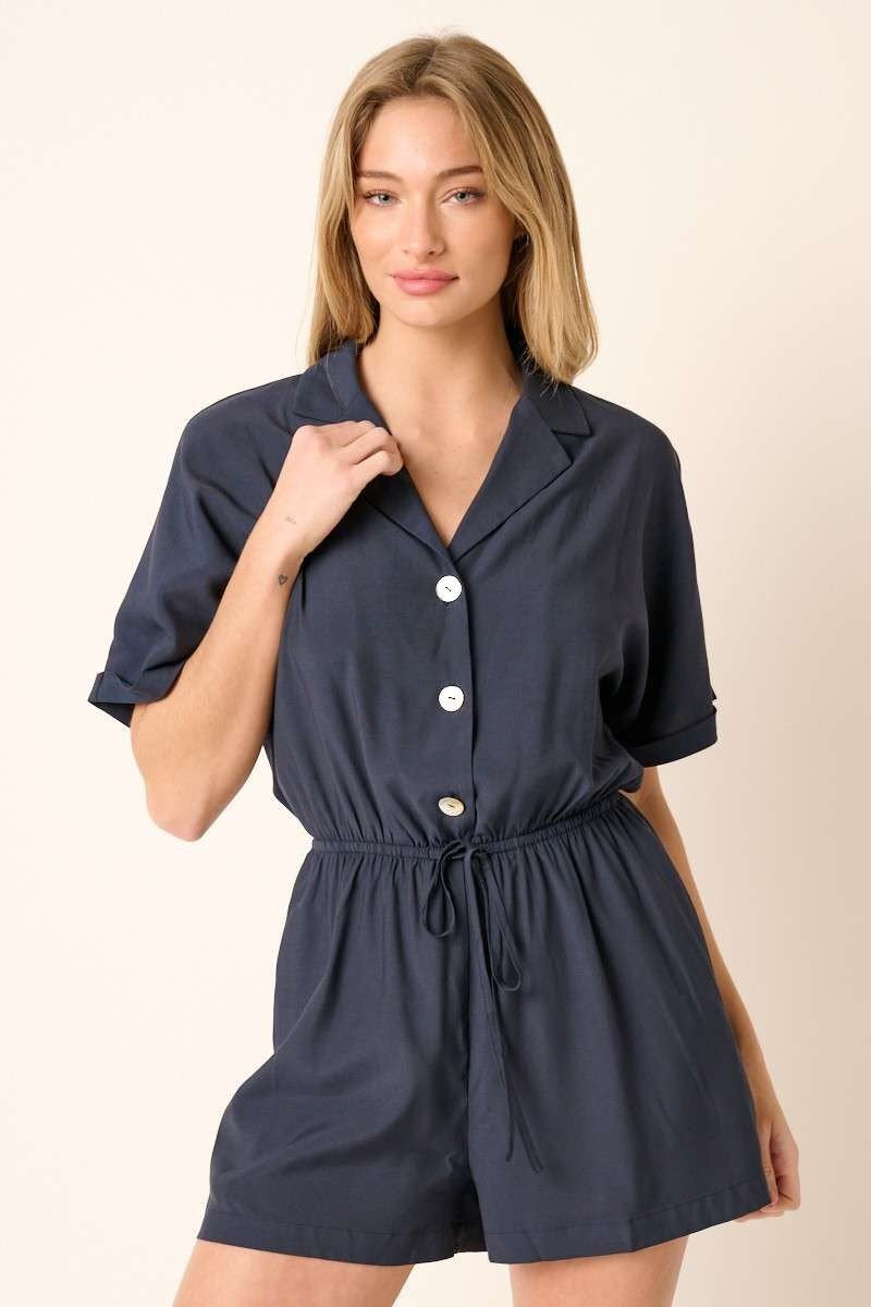 Kate Romper from Raggdoll Boutique, featuring a notch collar and button front design for trendy coastal style.