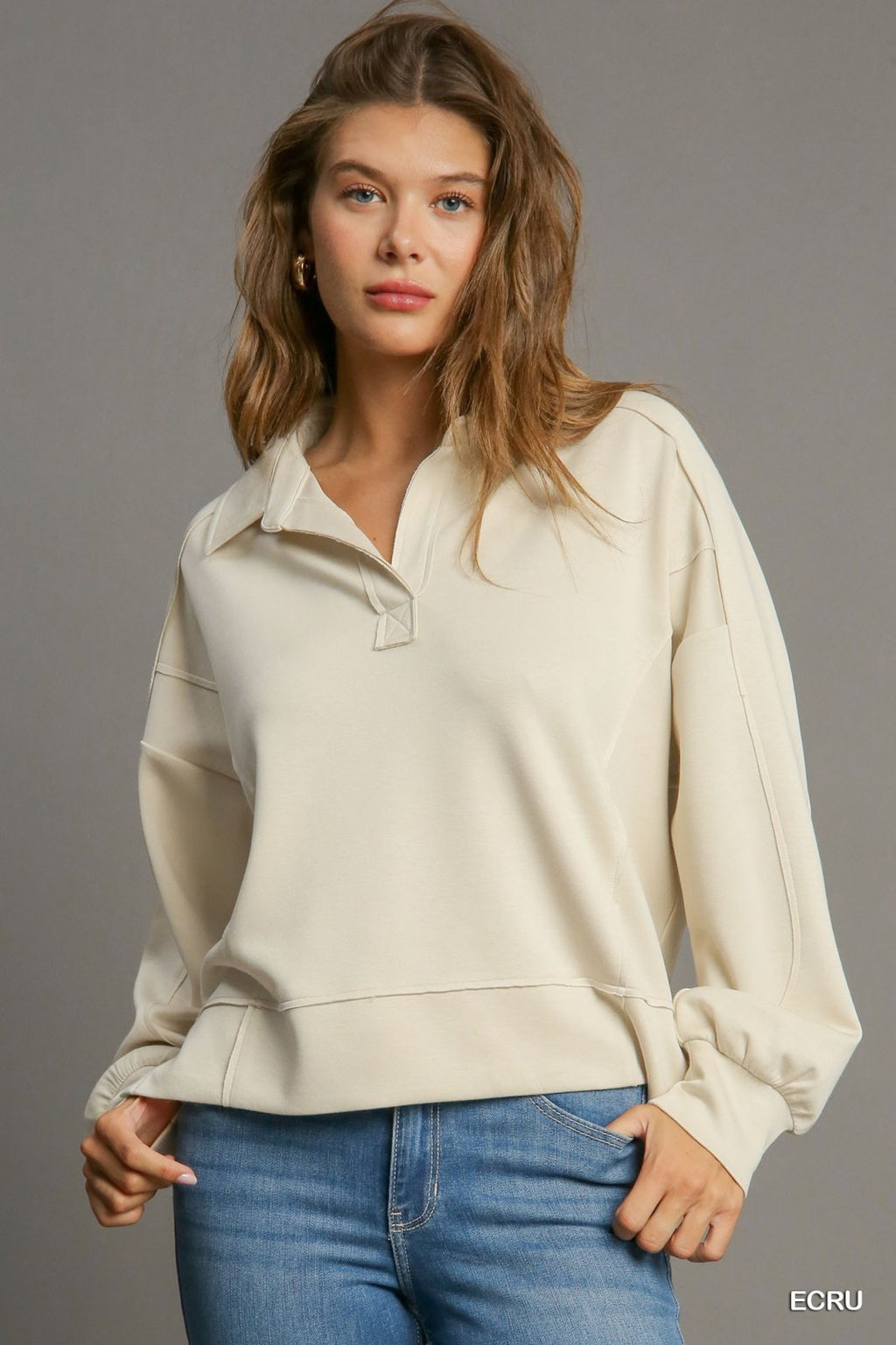 Ecru jogger suit showcasing stylish women's fashion, perfect for coastal boutique clothing and tropical vacation dresses.