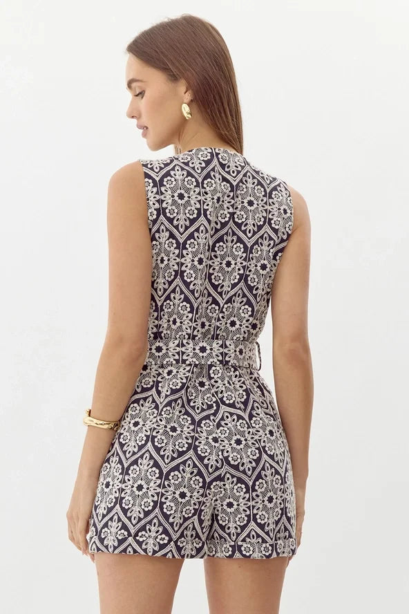 Katrina Embroidered Romper in navy, perfect for coastal boutique clothing and beach dresses. Ideal for tropical vacations.