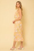 FLOWERS! YELLOW FLORAL HALTER DRESS from Raggdoll Boutique featuring trendy coastal style and perfect for summer outfits Texas.