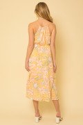 Back view of FLOWERS! YELLOW FLORAL HALTER DRESS from Raggdoll Boutique, perfect for summer outfits Texas.