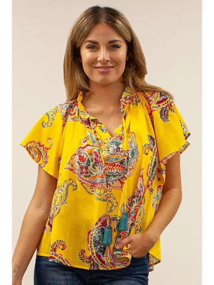 SANTARA BLOUSE from Raggdoll Boutique, a trendy coastal style top perfect for summer outfits in Port Aransas.