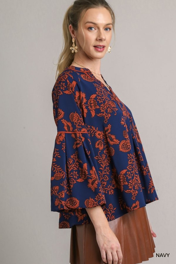 Navy orange printed top from Raggdoll Boutique, perfect for trendy coastal style and summer outfits Texas.