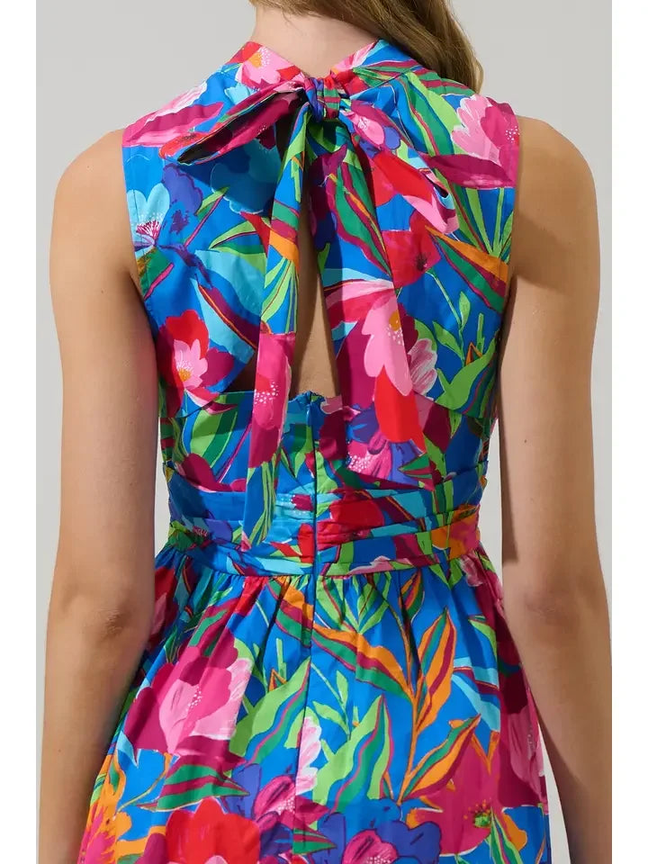 Back view of Naima Floral Hansen Mini Dress with vibrant multi floral print, stylish mock neckline and flirty tie detail.