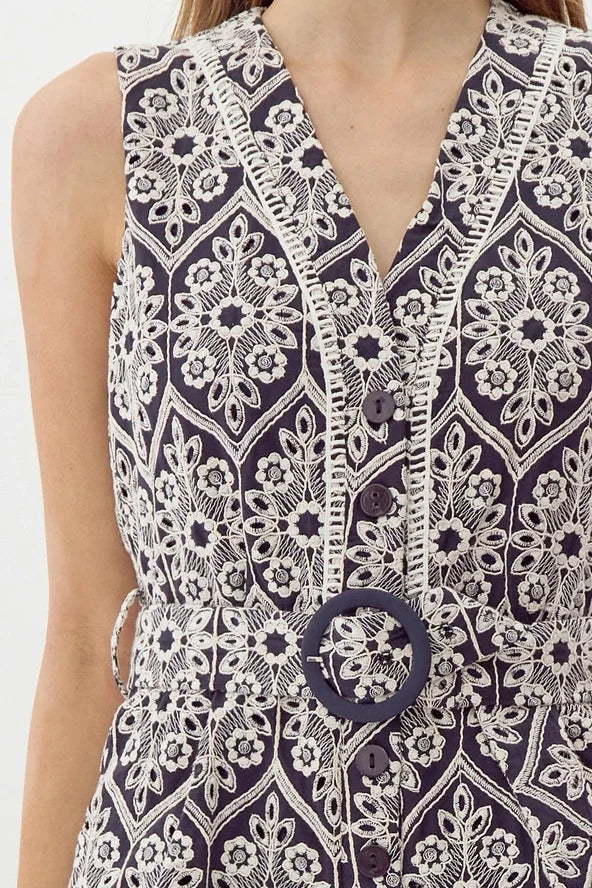 Katrina embroidered romper featuring intricate floral design, perfect for coastal boutique clothing and tropical vacation dresses.