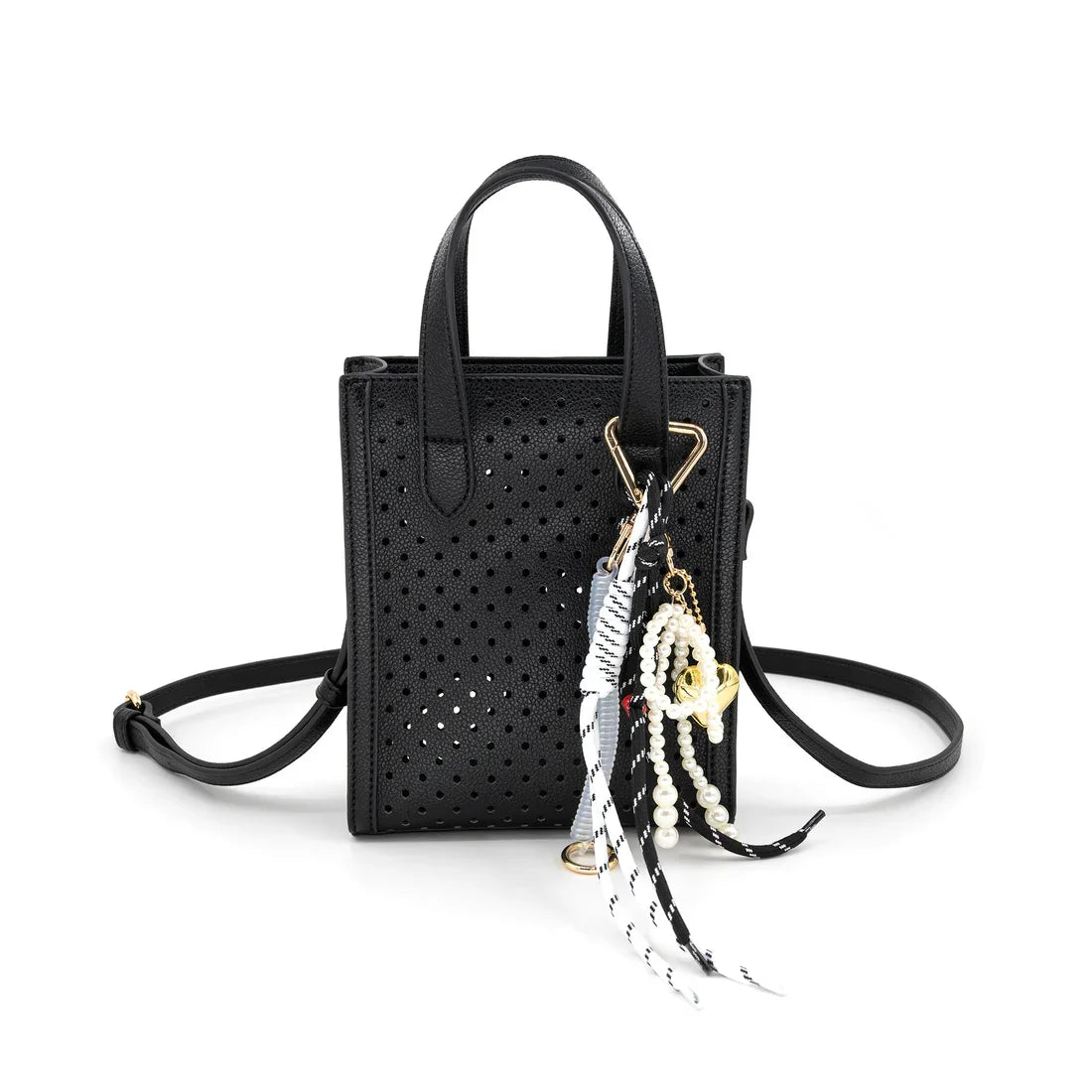 Ines Purse in perforated black with stylish accents, perfect for coastal boutiques and curated women's fashion.