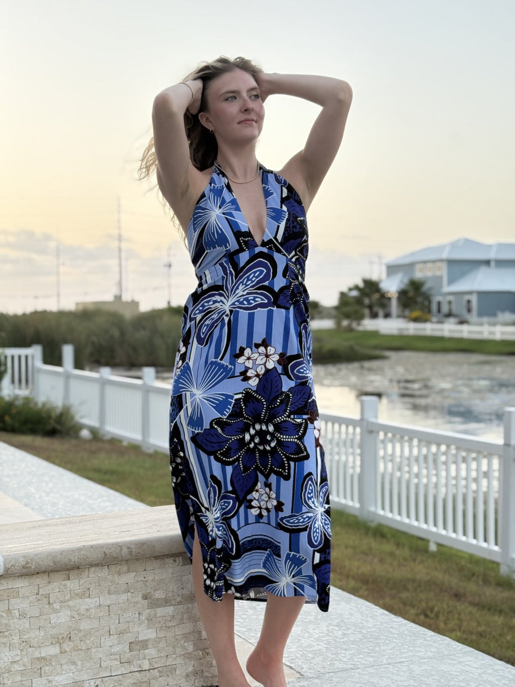 Blue multi halter-style island dress perfect for beach vacations, showcasing tropical elegance from a Port Aransas boutique.