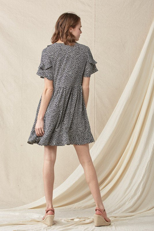 SWEET BLACK AND IVORY PRINT DRESS showcased at Raggdoll Boutique, ideal for trendy coastal style and summer outfits in Texas.