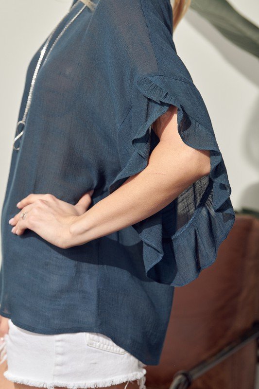 Navy Ruffle Sleeve Top from Raggdoll Boutique, perfect for trendy coastal style and summer outfits Texas.