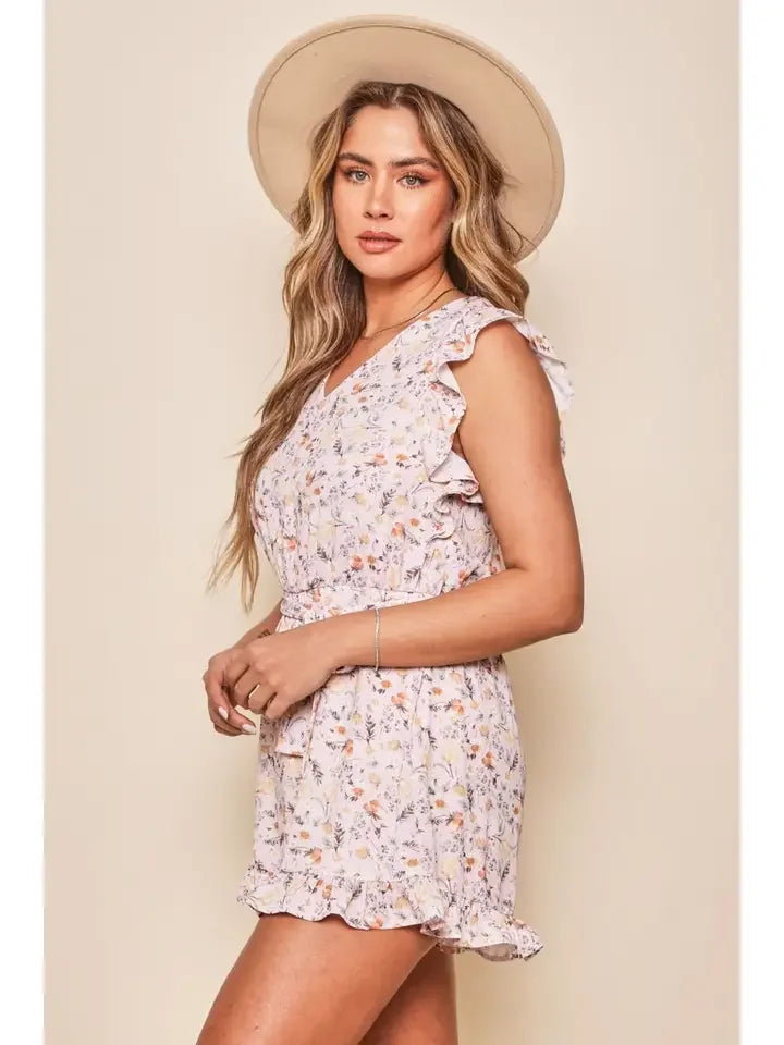 Darcy Romper floral print outfit from Raggdoll Boutique, perfect for summer outfits and coastal fashion.