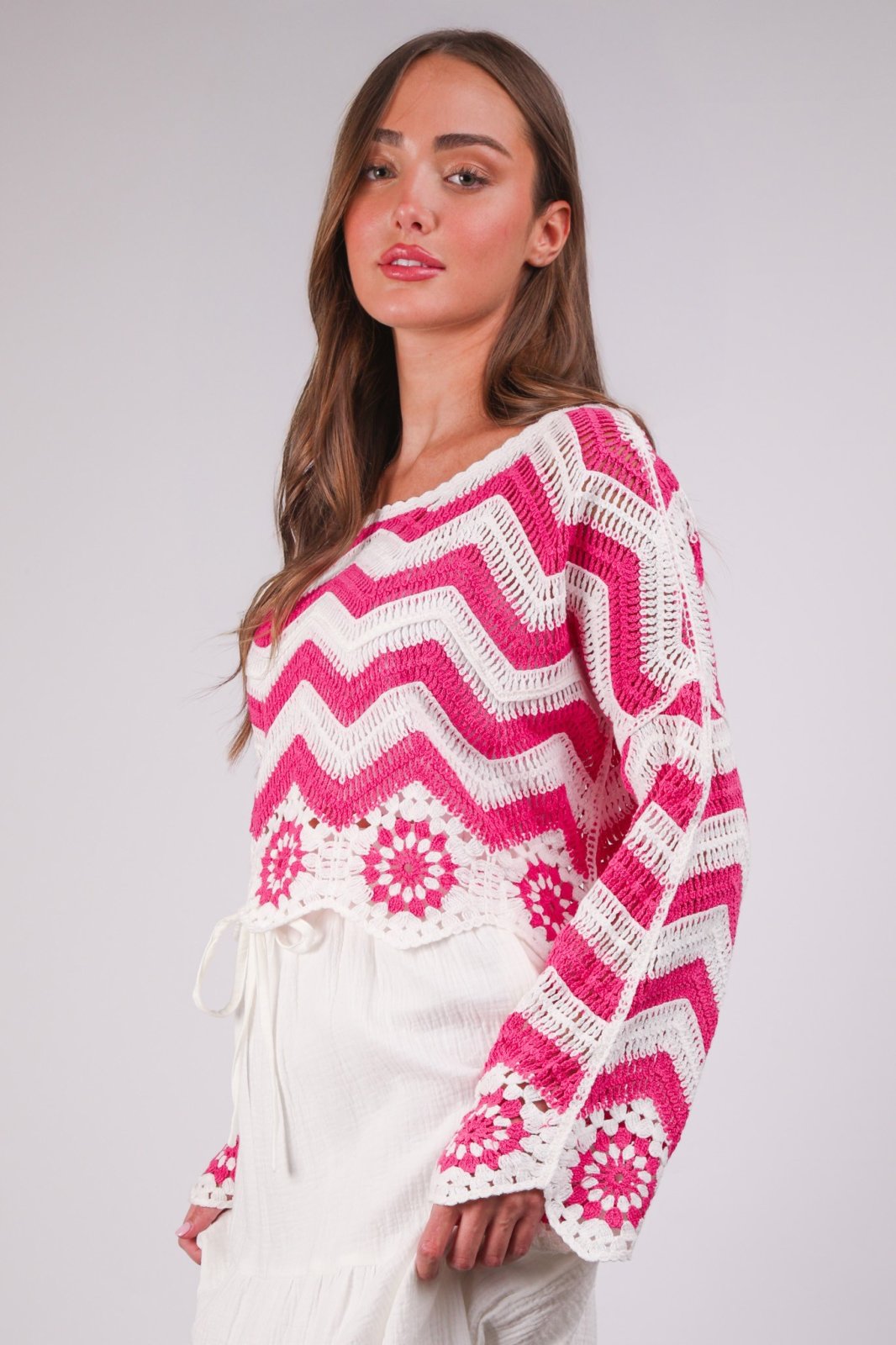 Stylish pink chevron crochet knit top for women, perfect for coastal boutique clothing and summer layering.