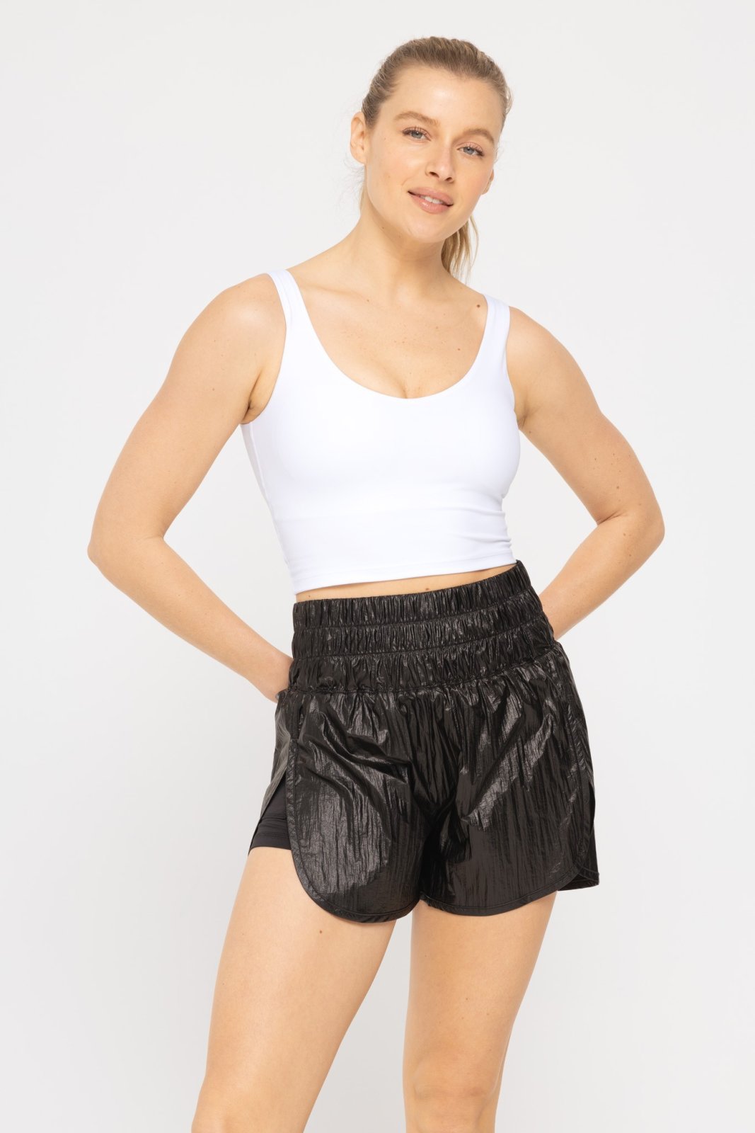 MONO B CRISS CROSS TANK WHITE paired with stylish black athletic shorts, ideal for summer outfits Texas.