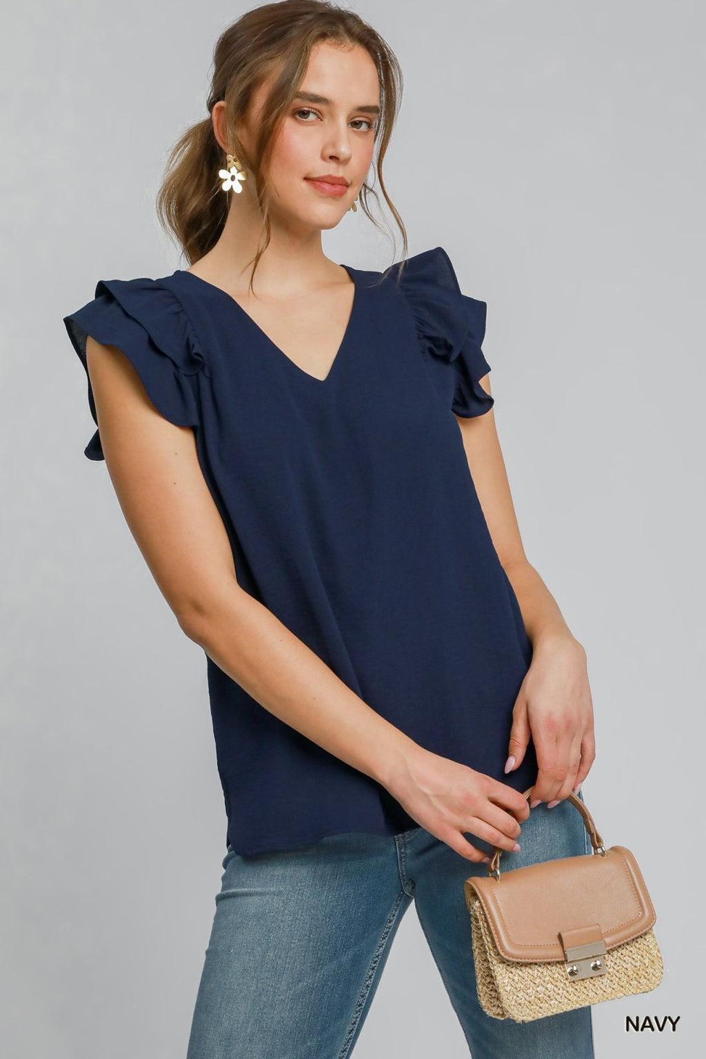 Indigo Rae Top in navy, double-layered flutter sleeve, perfect for coastal boutique clothing and stylish women's fashion.