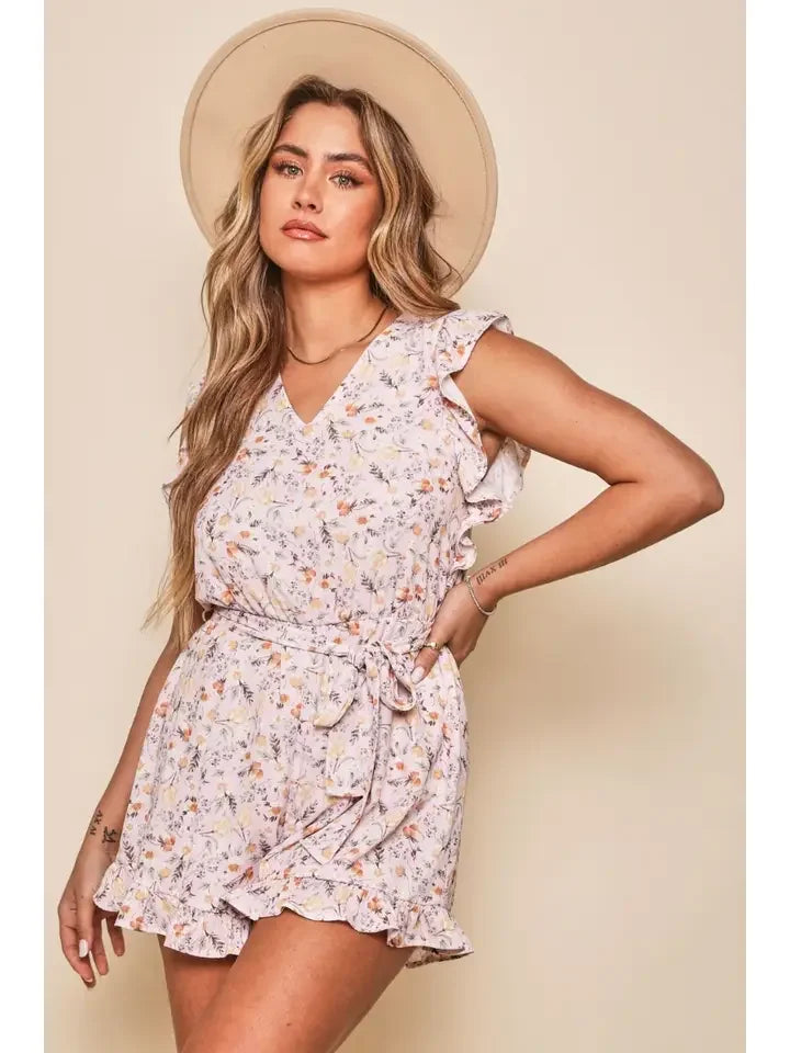 Darcy Romper from Raggdoll Boutique, a floral print romper perfect for trendy coastal style and summer outfits Texas.
