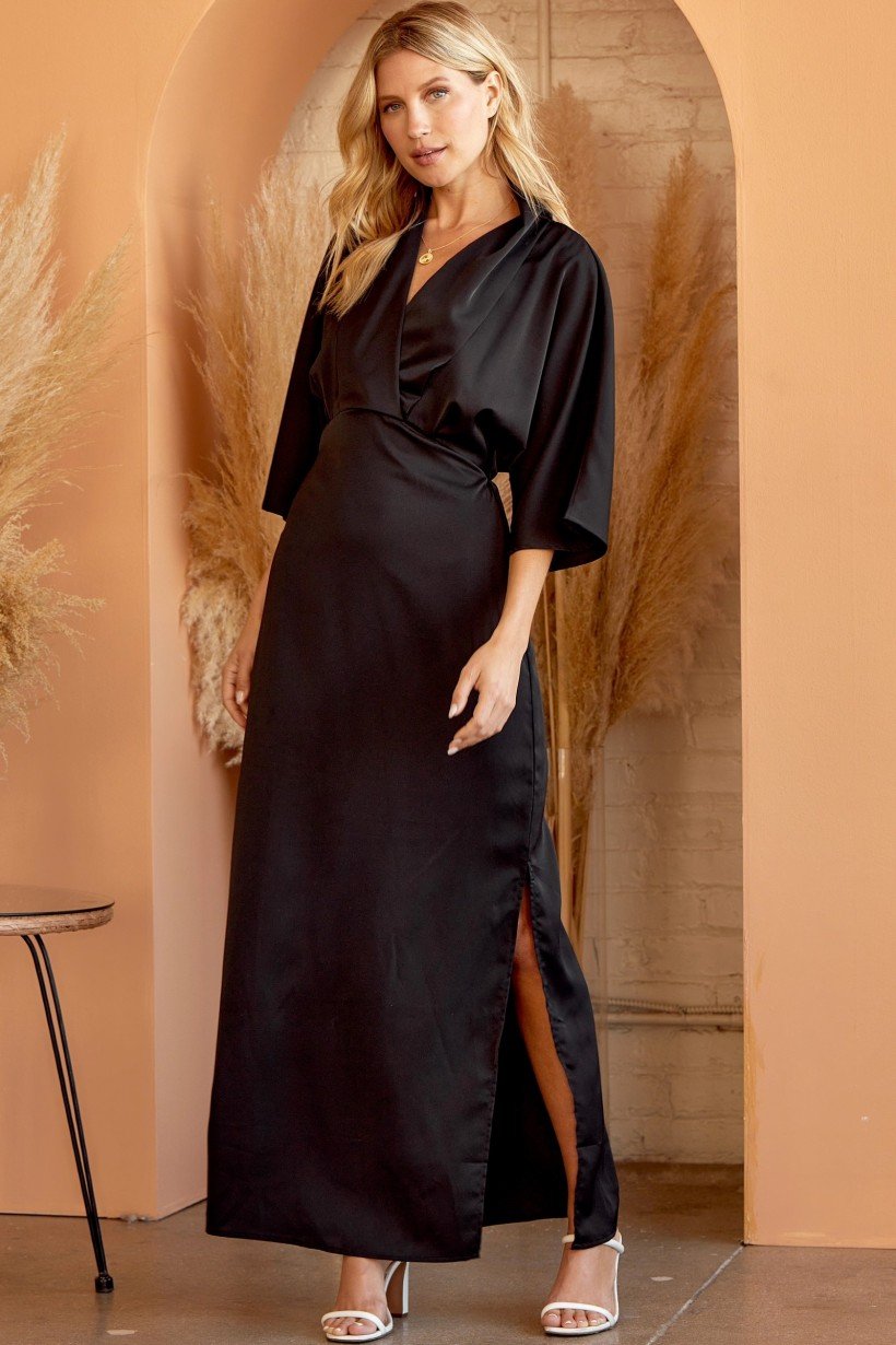 Andree Dress from Raggdoll Boutique, stylish black maxi with side slit, perfect for coastal fashion in Port Aransas.