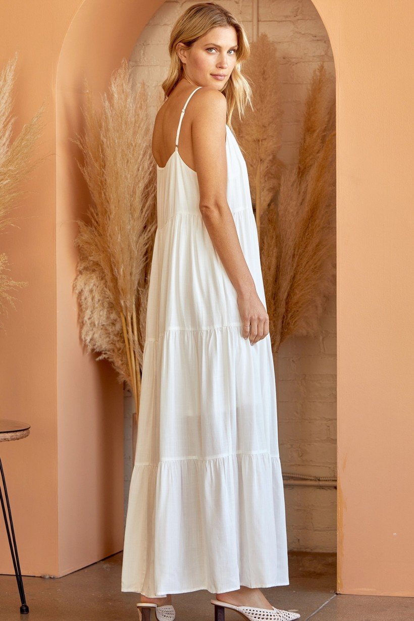 Woman in a white maxi dress showcasing the KEEP IT SIMPLE DRESS from Raggdoll Boutique, perfect for summer outfits Texas.