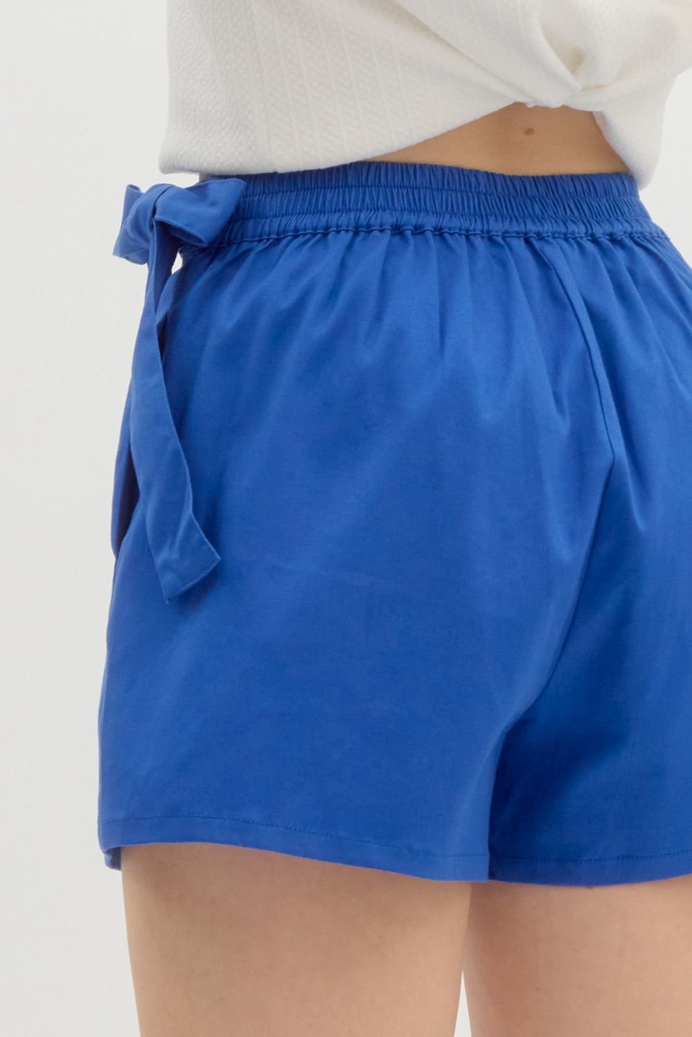 Royal blue skort with tie detail, perfect for coastal boutique clothing and stylish women's bottoms for summer.