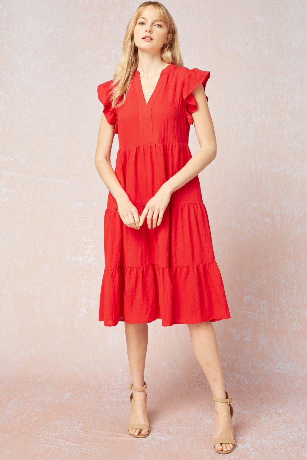 RED TIERED DRESS from Raggdoll Boutique, perfect for summer outfits in Texas. Lightweight and stylish dip hem design.