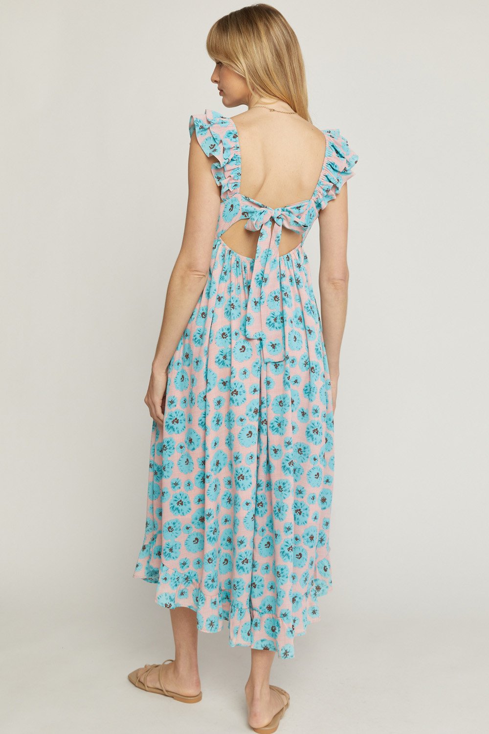 SUMMER BLOOMS MIDI DRESS from Raggdoll Boutique showcasing trendy coastal style for vacation wardrobe.