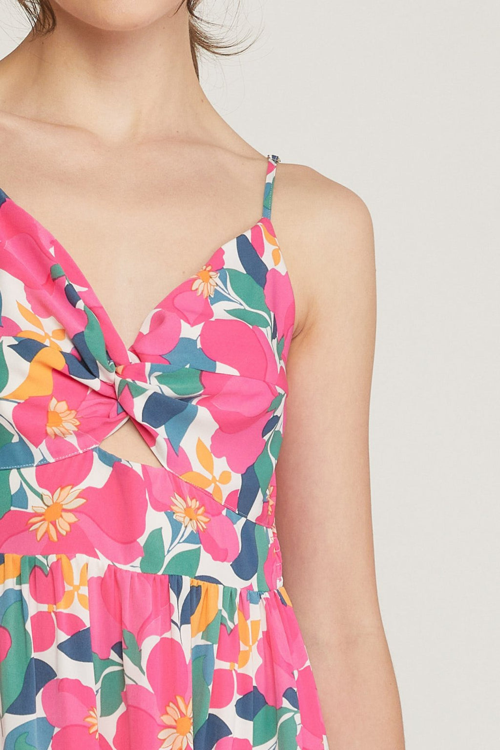 FLIRTY IN FLORAL MIDI DRESS from Raggdoll Boutique, featuring vibrant floral patterns perfect for summer outfits Texas.