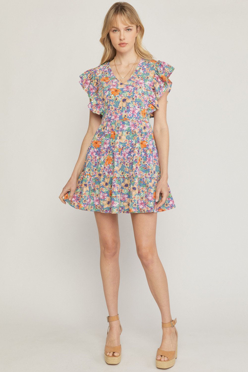 FIELD OF FLOWERS DRESS showcasing floral design, perfect for vacation wardrobe boutique at Raggdoll Boutique.