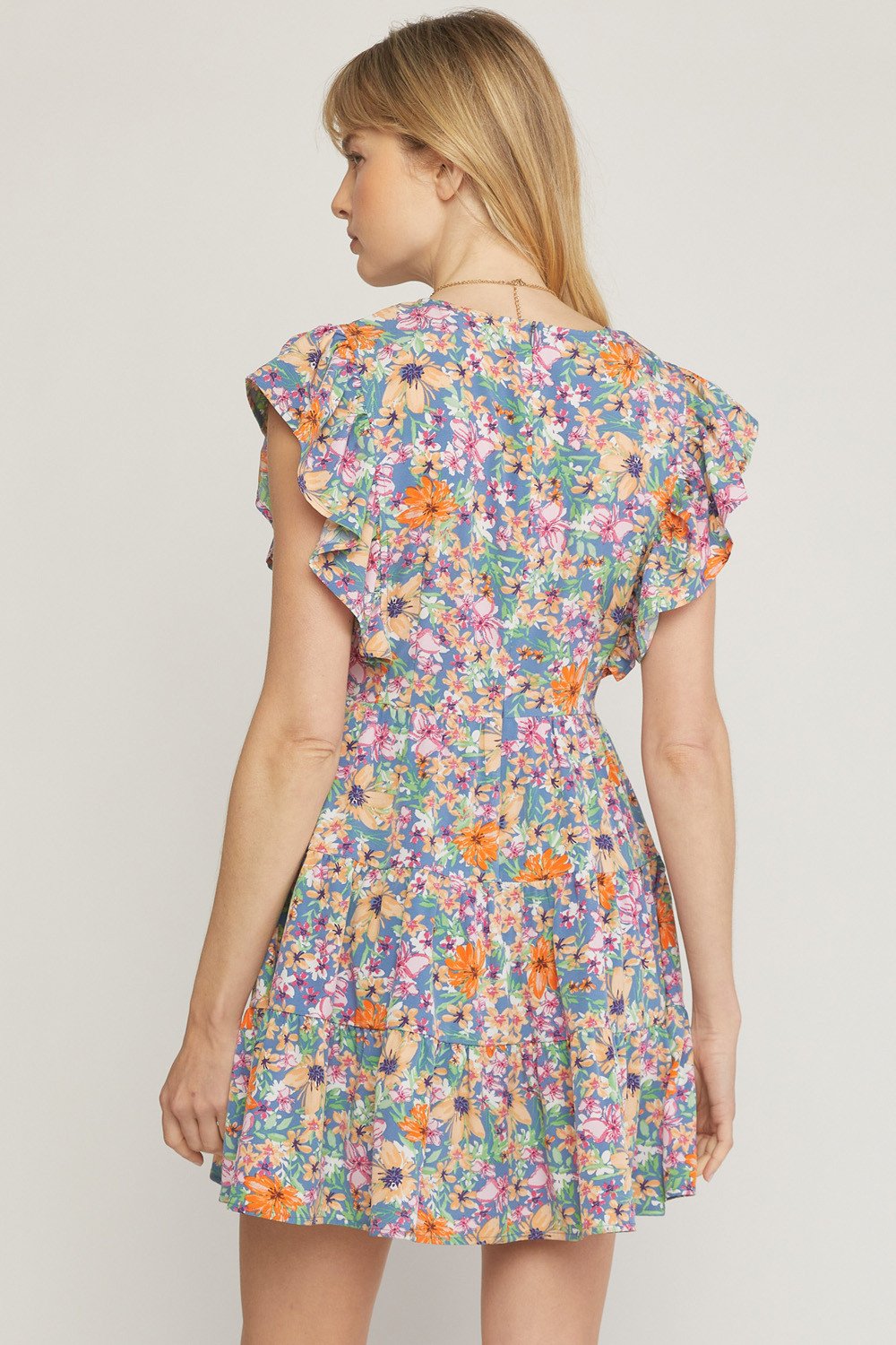 FIELD OF FLOWERS DRESS showcasing vibrant floral design, perfect for summer outfits Texas, available at Raggdoll Boutique.