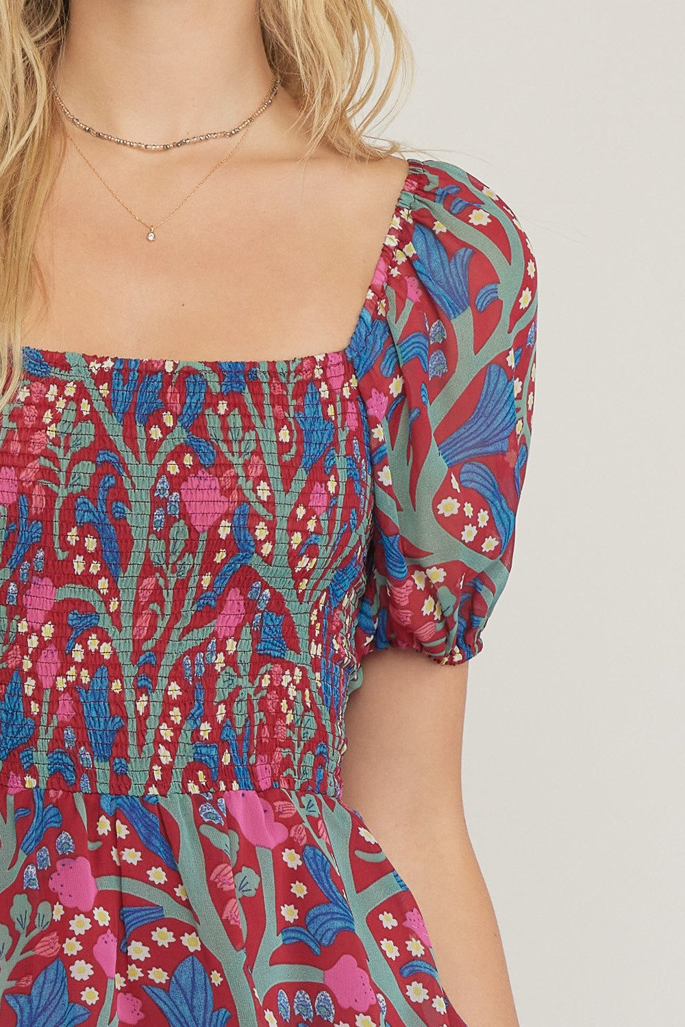 TIME TO CELEBRATE DRESS featuring vibrant floral print, offered by Raggdoll Boutique, perfect for summer outfits in Texas.