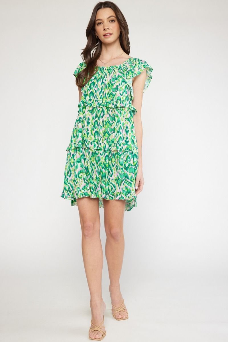 Girls Love Swirls dress in vibrant green print, perfect for beach outings. Curated women's fashion from Port Aransas boutique.