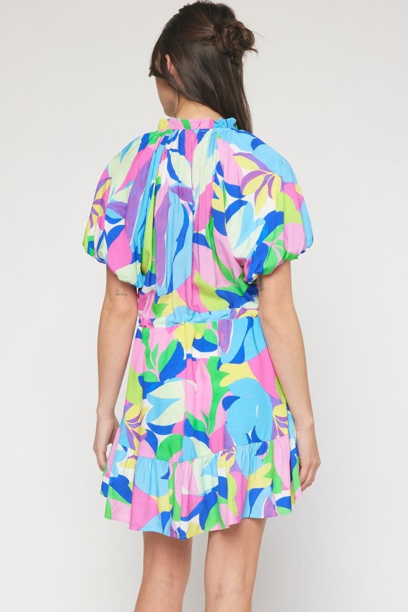 Color Crush Dress in vibrant tropical print, perfect for beach days. Available at Port Aransas boutique for stylish outfits.