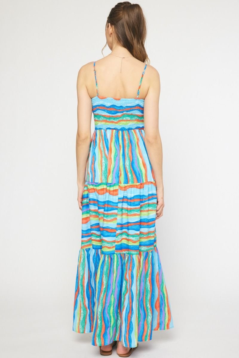 Back view of BLUE WAVES MIDI DRESS, a trendy coastal style from Raggdoll Boutique, perfect for summer outfits Texas.