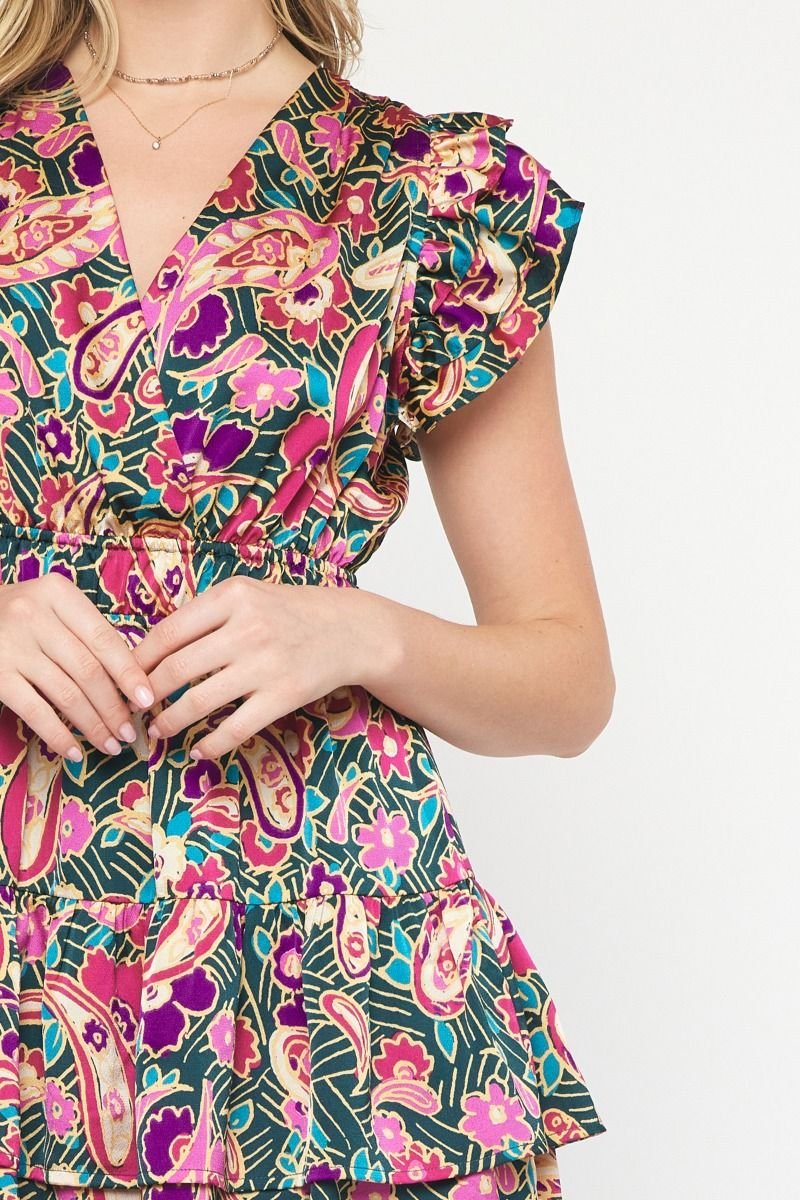 Beautiful dress with floral prints, ideal for tropical vacations, part of curvy plus size fashion at a coastal boutique.