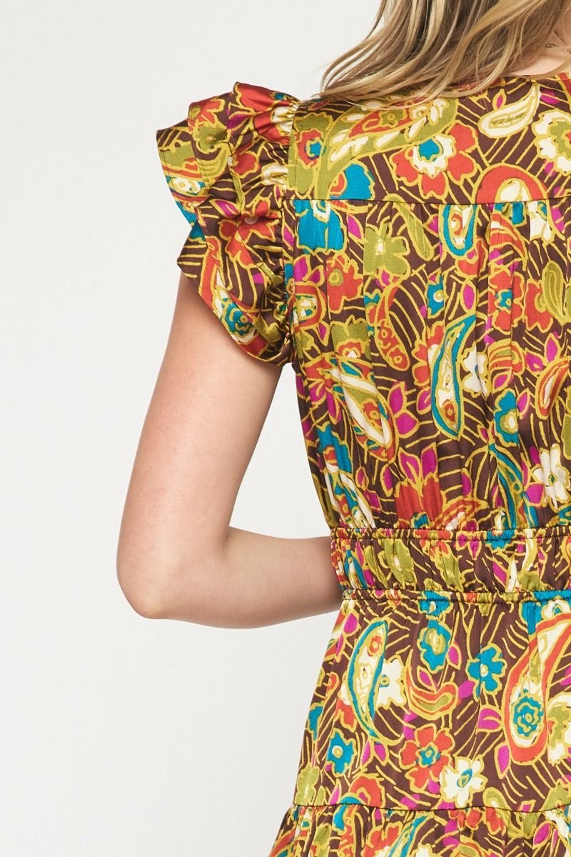 Back view of the IT'S A DATE DRESS highlighting colorful floral patterns, perfect for trendy coastal style at Raggdoll Boutique.