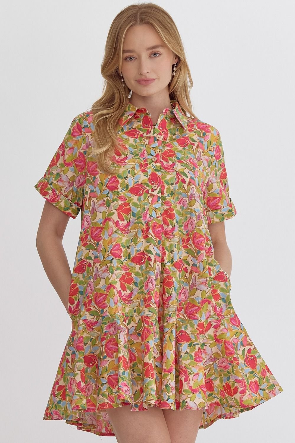 A woman wearing the Shower Me with Flowers Dress from Raggdoll Boutique, showcasing trendy coastal style.
