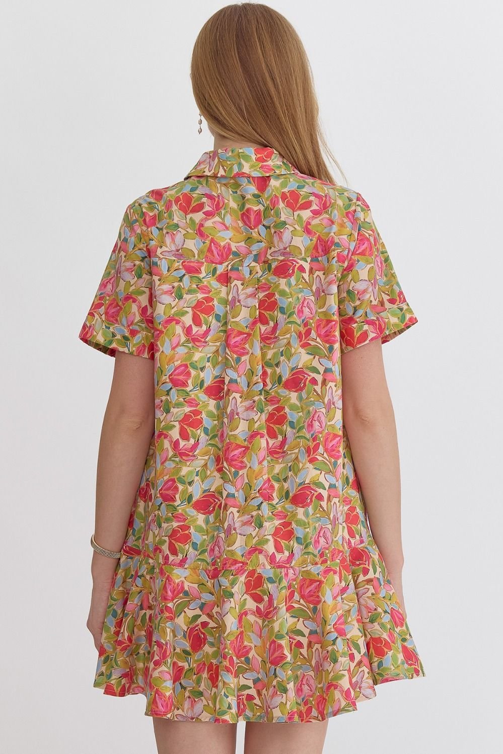 Back view of Shower Me with Flowers Dress, a trendy choice from Raggdoll Boutique for women’s summer outfits Texas.