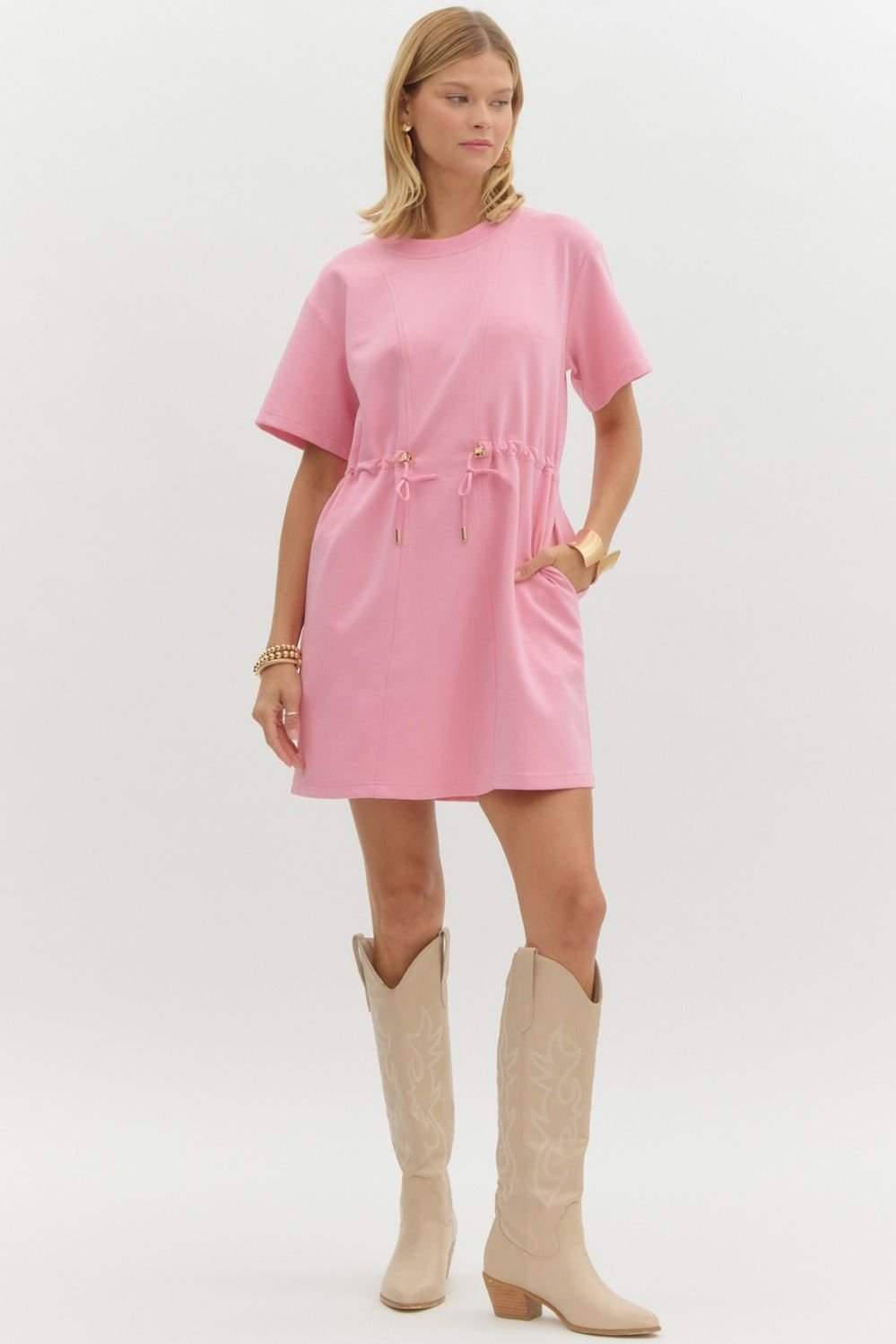 Stylish pink Bailey dress featuring a drawstring waist, perfect for coastal boutique clothing and tropical vacations.