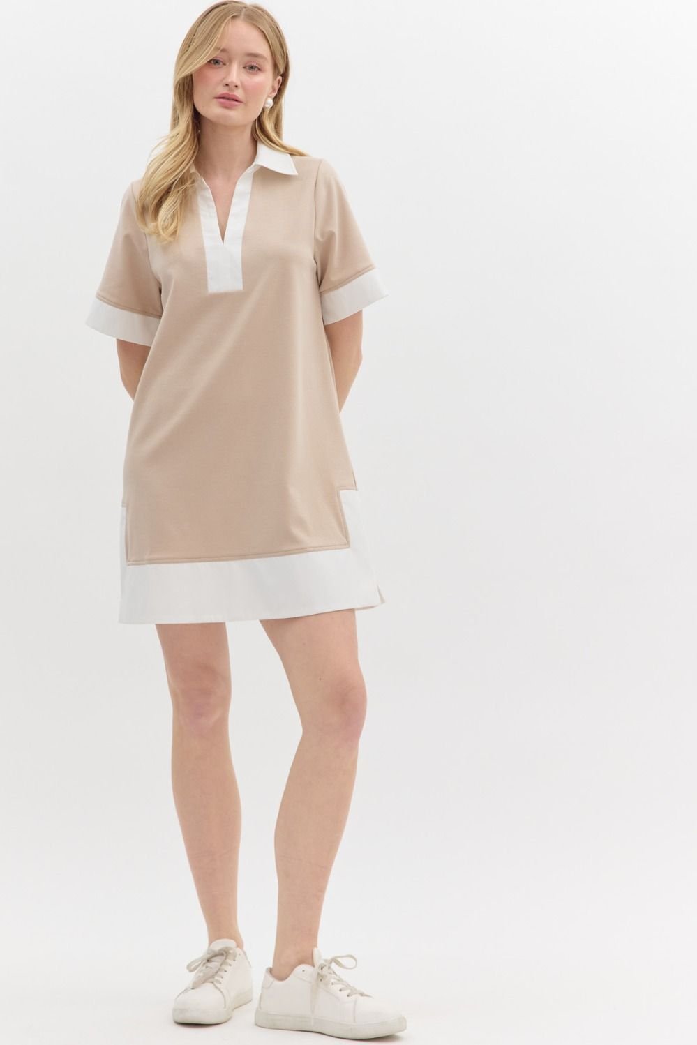 Lara Dress from a coastal boutique, stylish beach dress perfect for tropical vacations, featuring a chic collar and soft fabric.