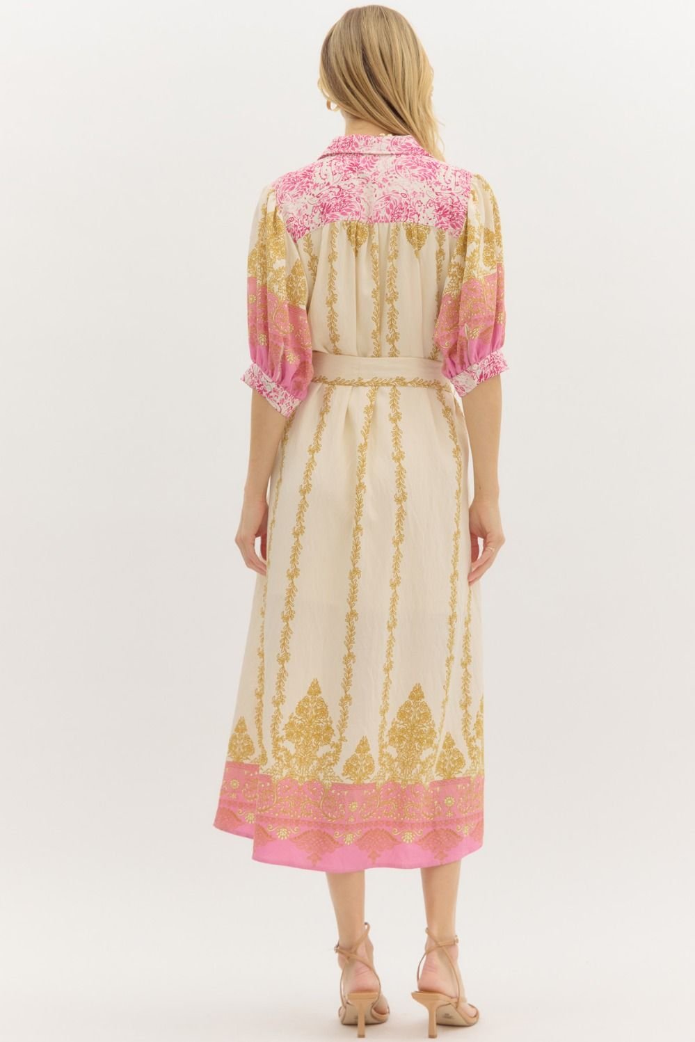 Daydream Dress from a coastal boutique; tailored chic midi dress with ¾ sleeves, perfect for tropical vacations and beach outings.
