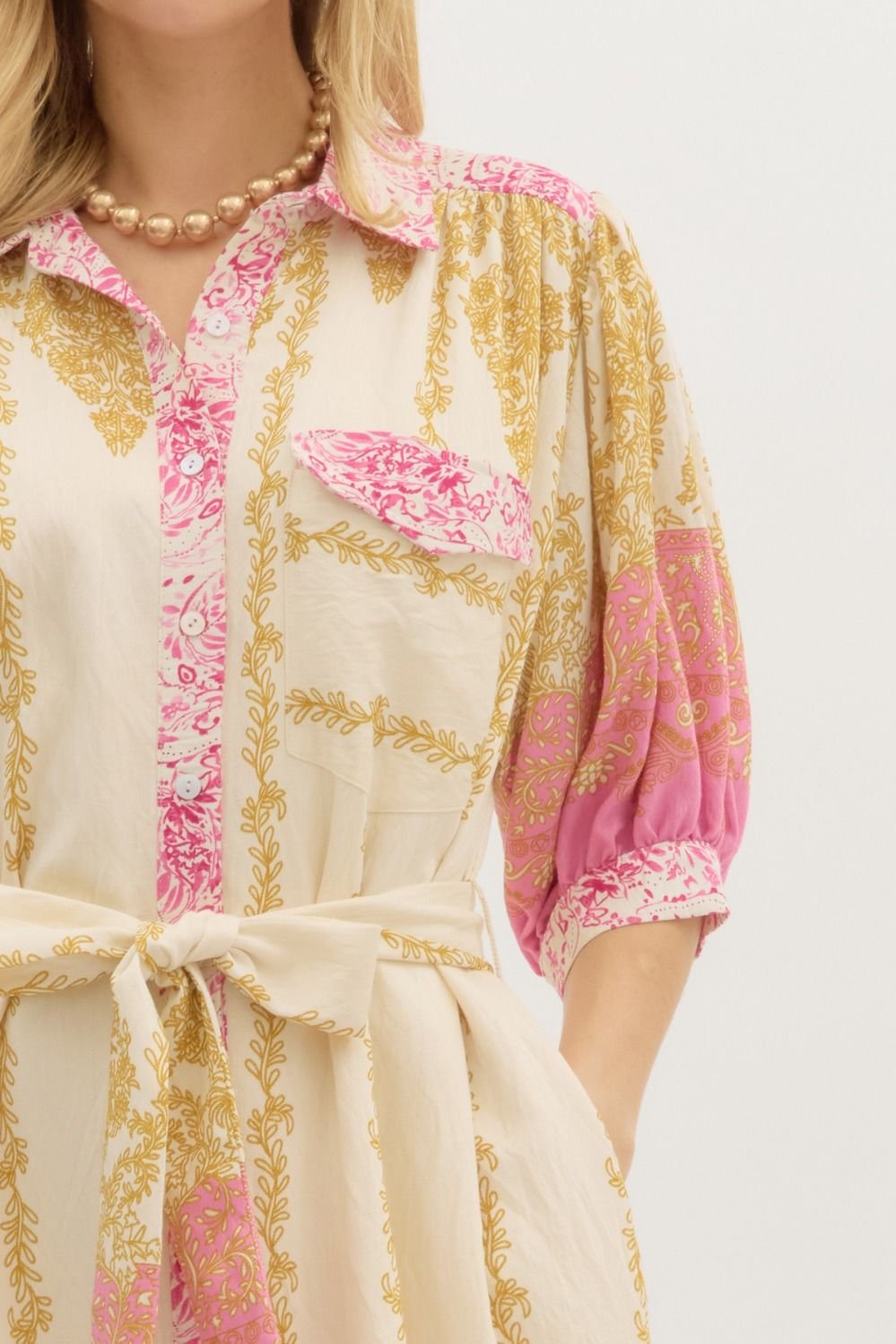 Daydream Dress: chic pink print midi dress, perfect for coastal boutique clothing and tropical vacations.